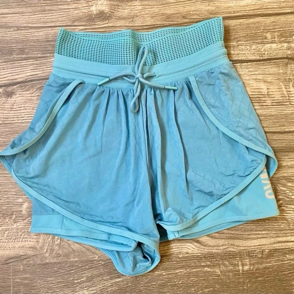Gymshark Geo mesh two in one shorts in blue‎ size xs